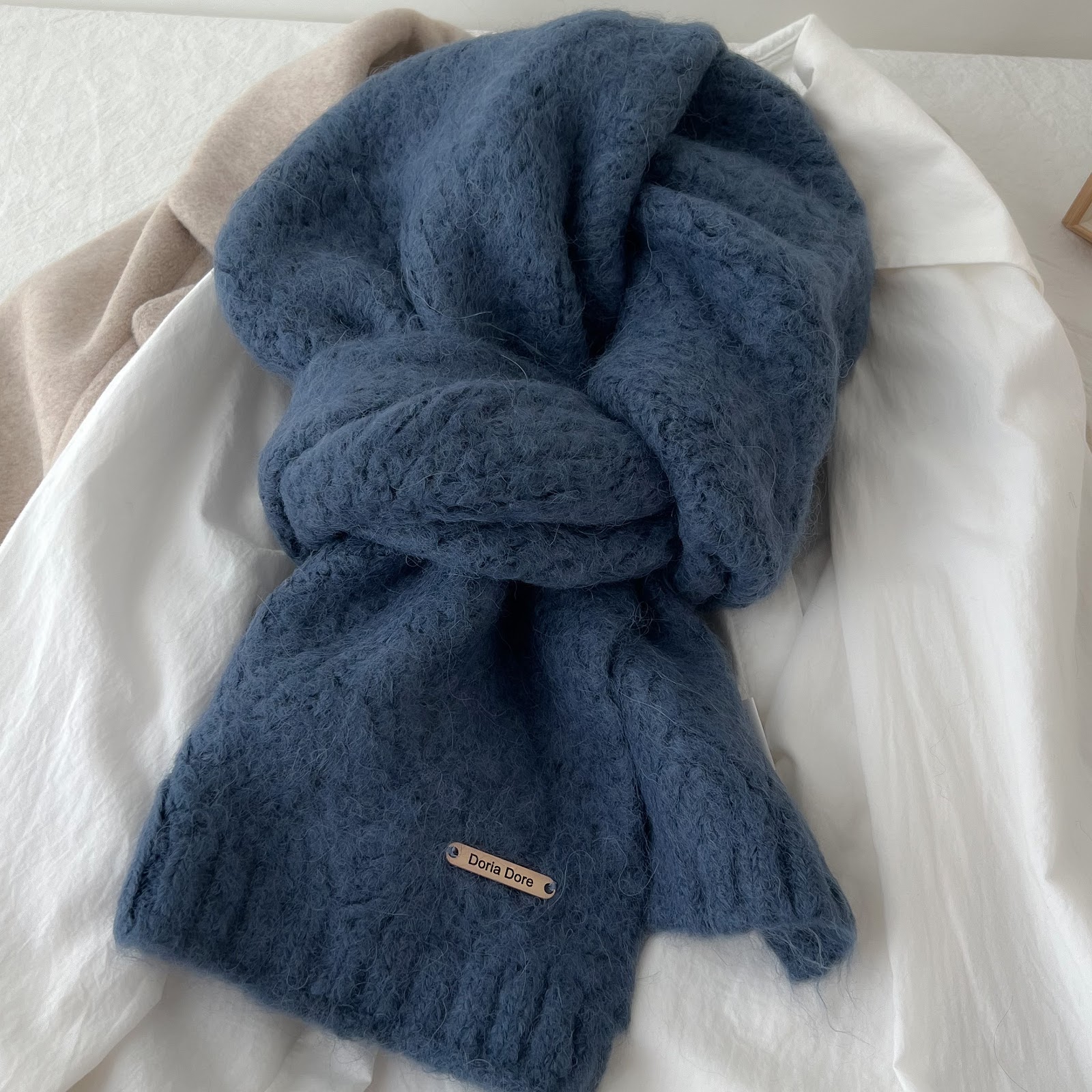 Knitted scarf made of alpaca wool blend