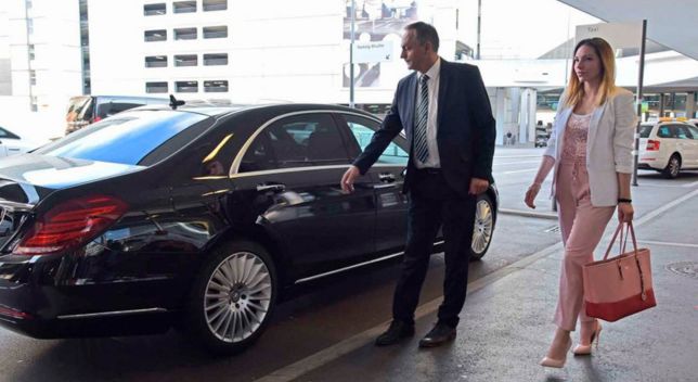 Chauffeur receiving arriving executives