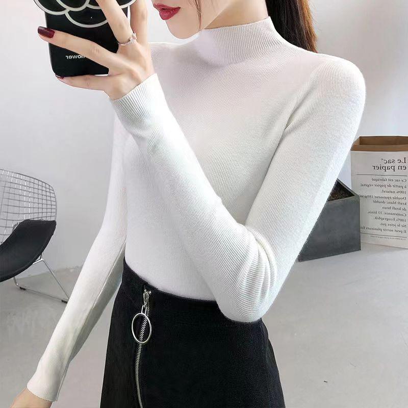 Women's knitted pullover with a stand-up collar, slim fit