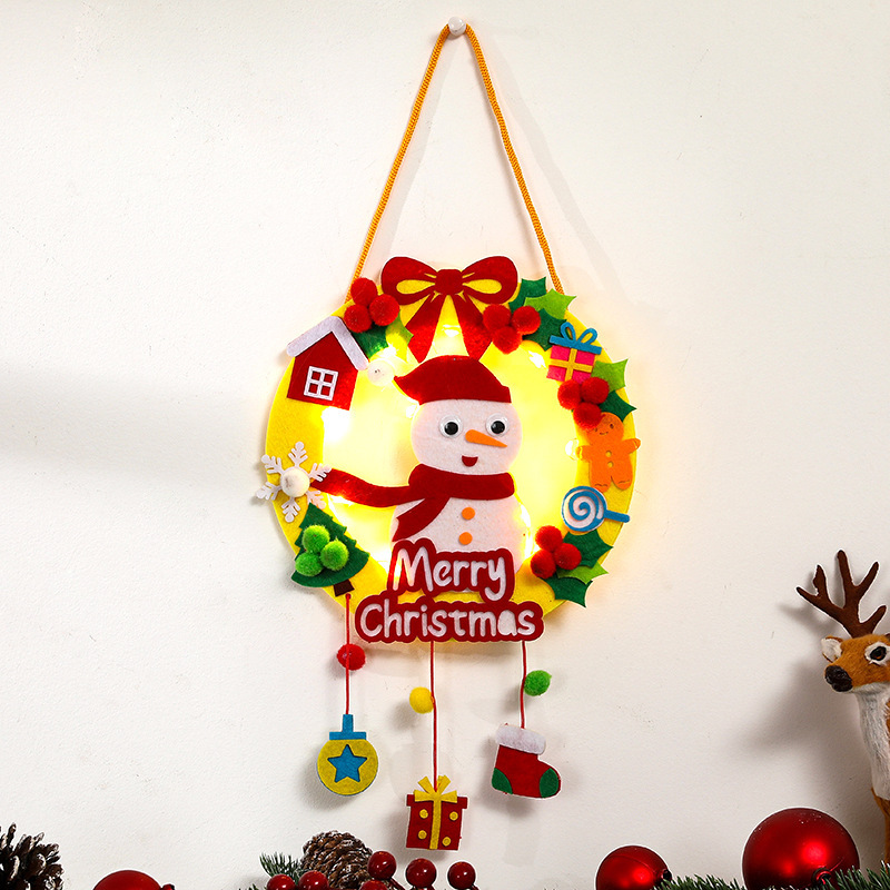 Christmas wreath made of fabric with LED lighting
