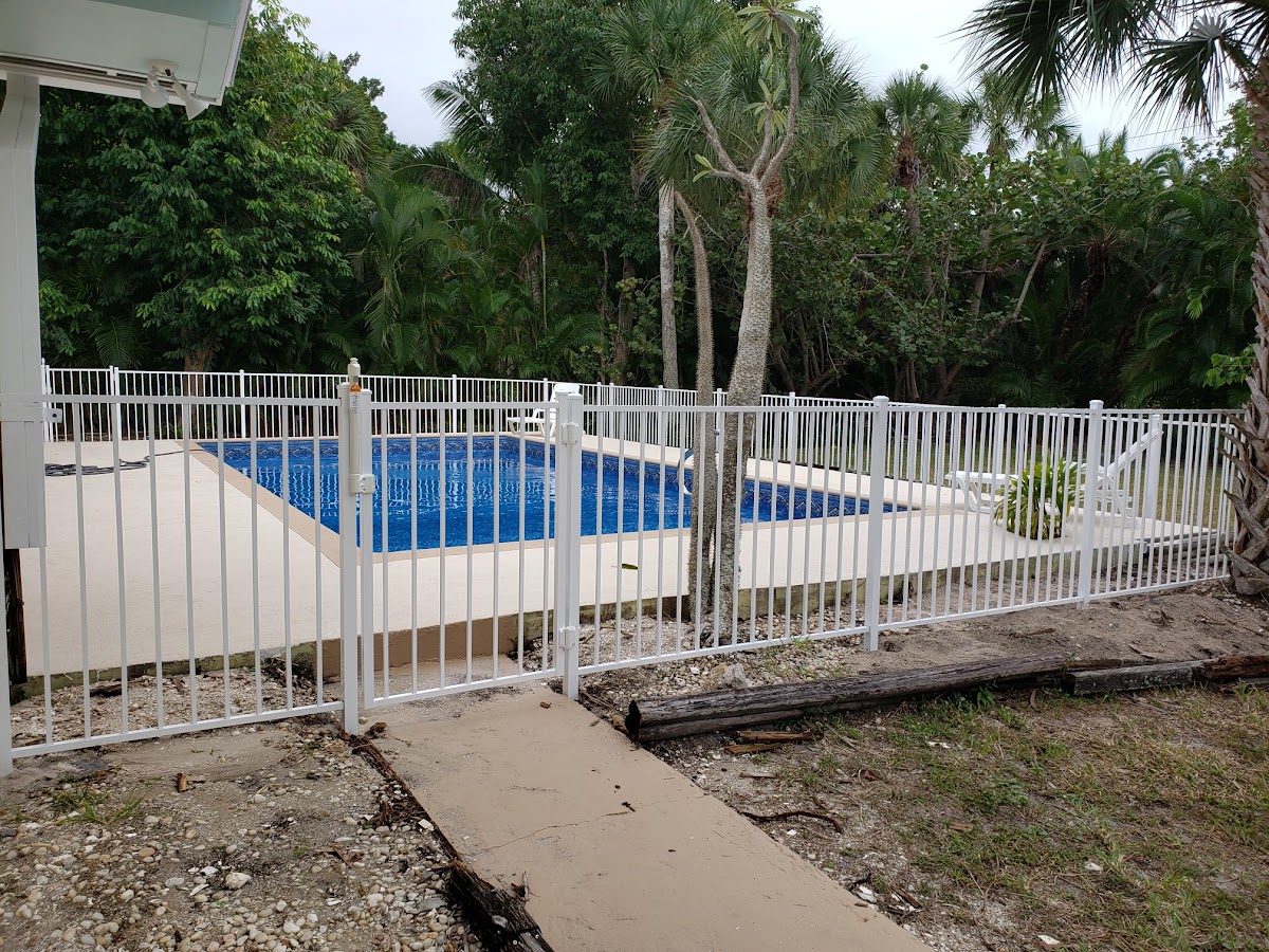 Pool fence installation Cape Coral Naples Florida Chapter 515 compliant — Premier Fence of SWFL