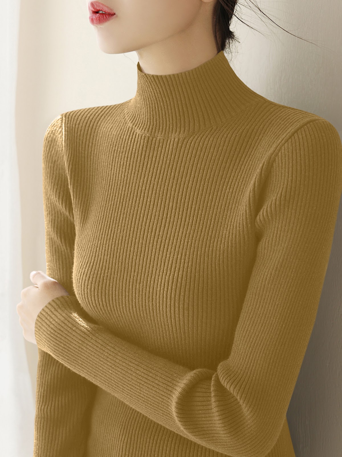 Women's knitted wool sweater with a half-stand collar