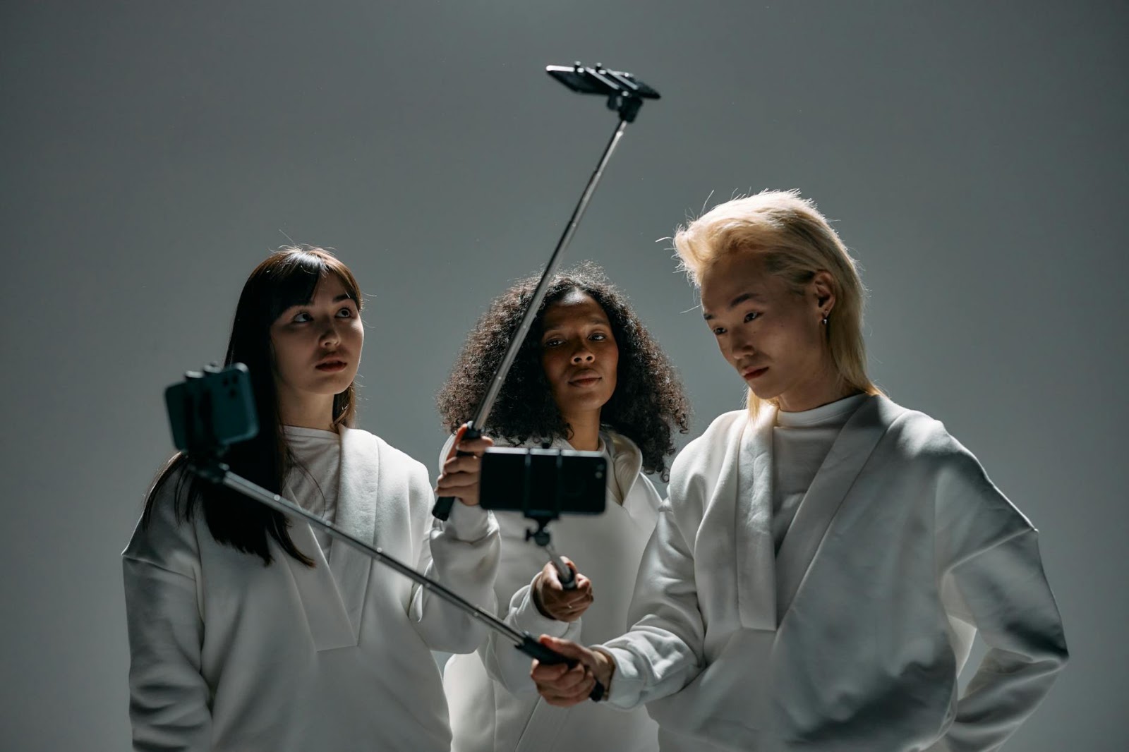 A diverse group of digital avatars engaging in AI virtual try-on, illustrating the personalized future of fashion retail.