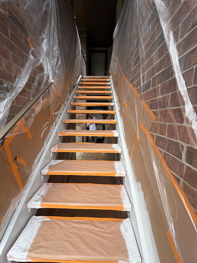 The Knoll, coating application in progress — view 1