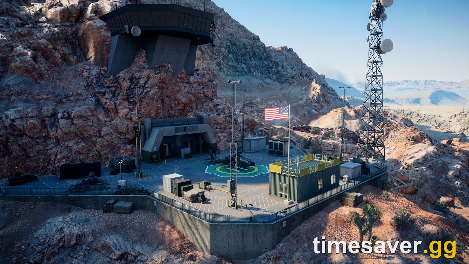 Battlefield 6 elevated view of the Area 51 compound built into rocky mountains, showing a communications tower, satellite dishes, an empty helipad and a bunker entrance