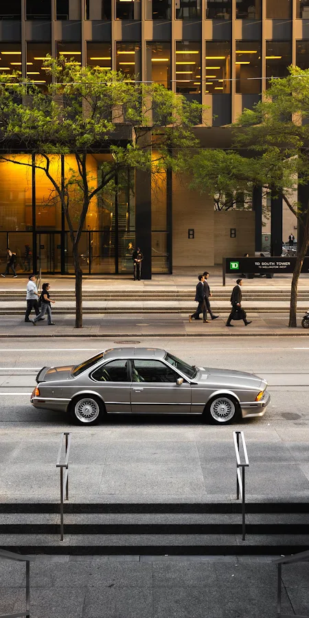 Classic BMW Coupe In Downtown 2K iPhone Phone Wallpaper