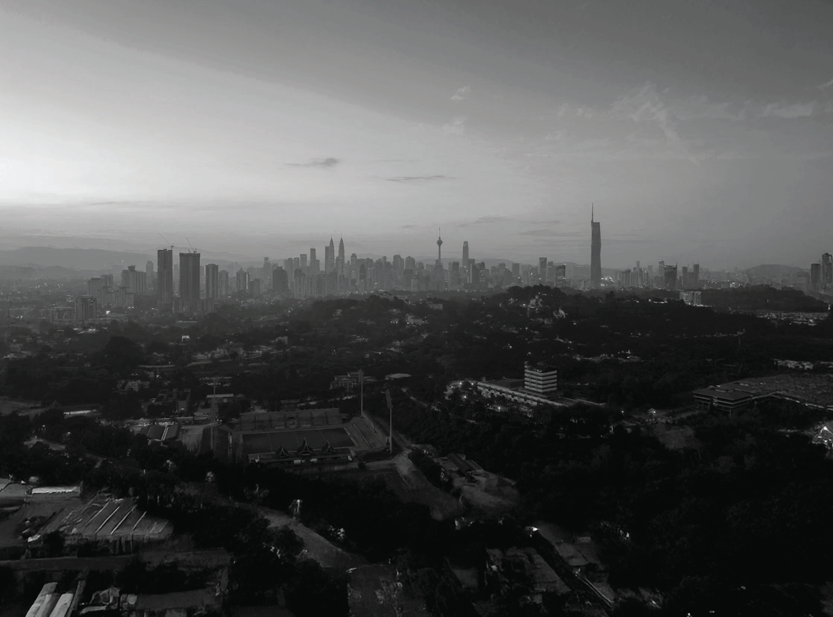 M Aurora — city skyline monochrome