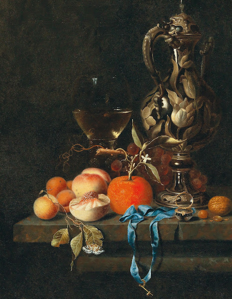 Apricots peaches and other fruit with glass and a jug
