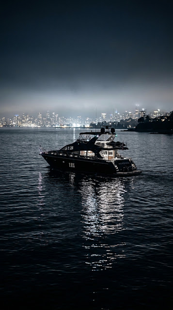 Black Yacht in Calm Midnight Waters with Fog Wallpaper - Free mobile Wallpaper