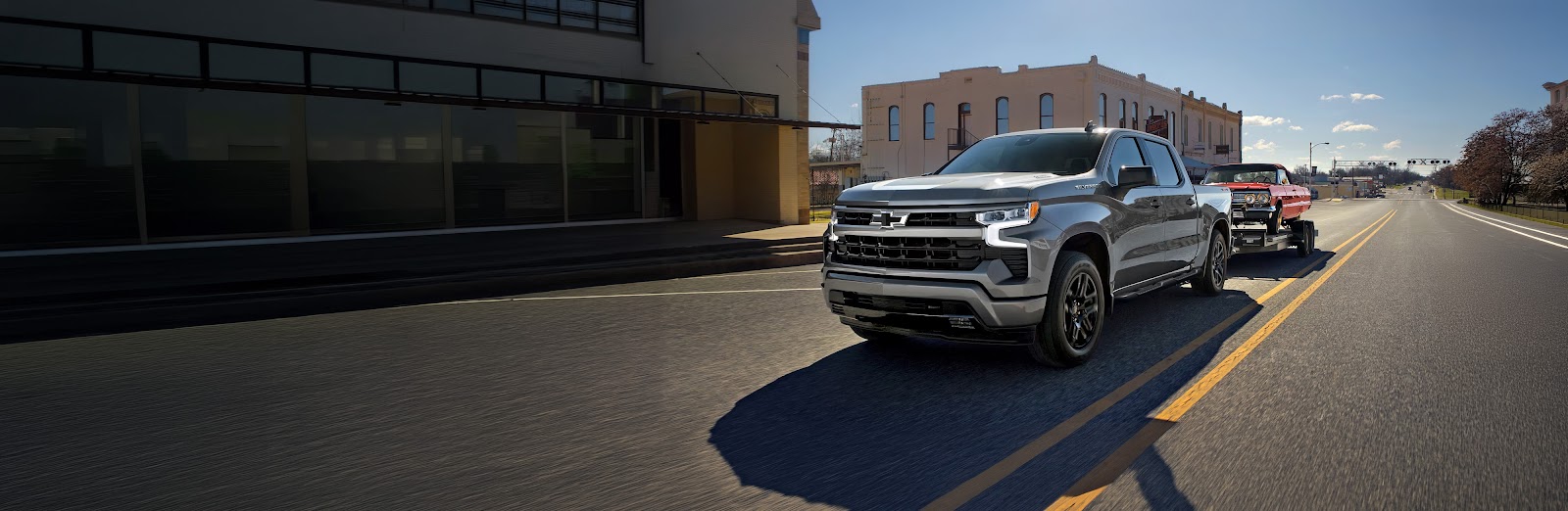 2026 Chevrolet Silverado 1500 towing a large trailer demonstrating maximum towing capacity