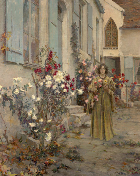 Young Woman Near A House With Rose Bushes