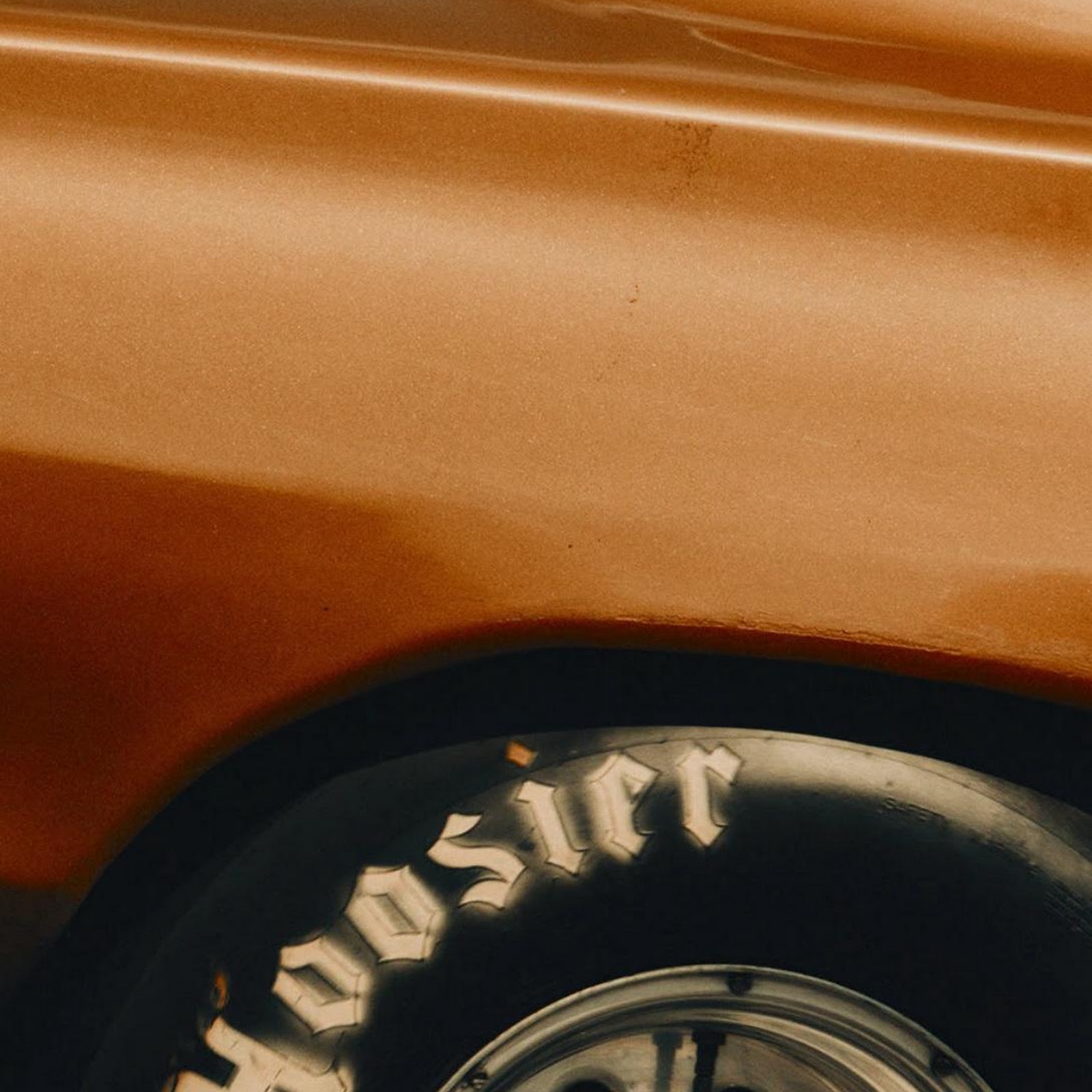 Download Vintage Copper Race Car Wheel Full HD iPhone