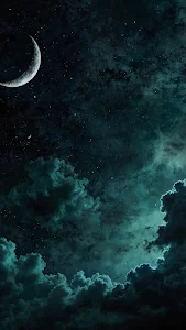 Crescent Moon Over Stormy Night Sky