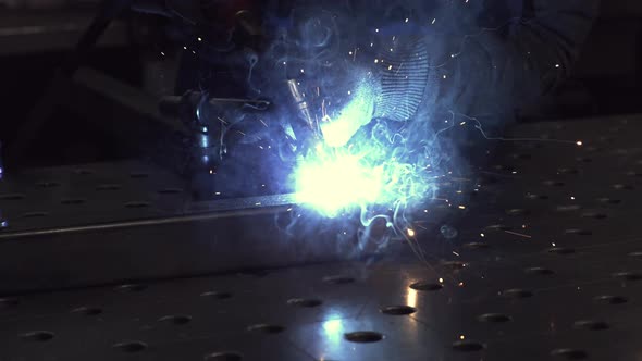 Welding Torch Joins Metal Pieces With Sparks Free Download – Envato Elements