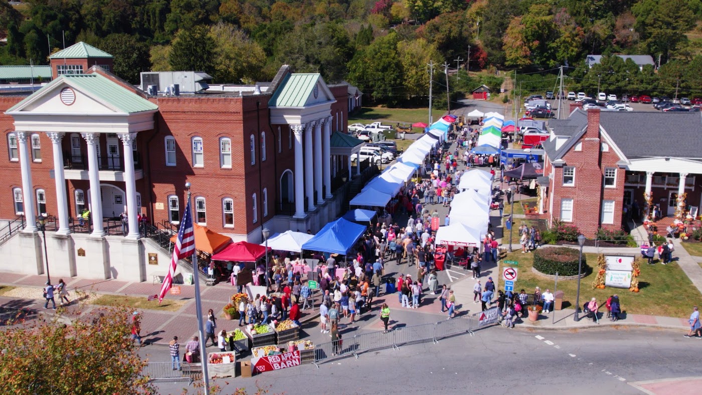 Aerial view of downtown Ellijay, Georgia and the courthouse square filled with Georgia Apple Festival crowds and vendor tents