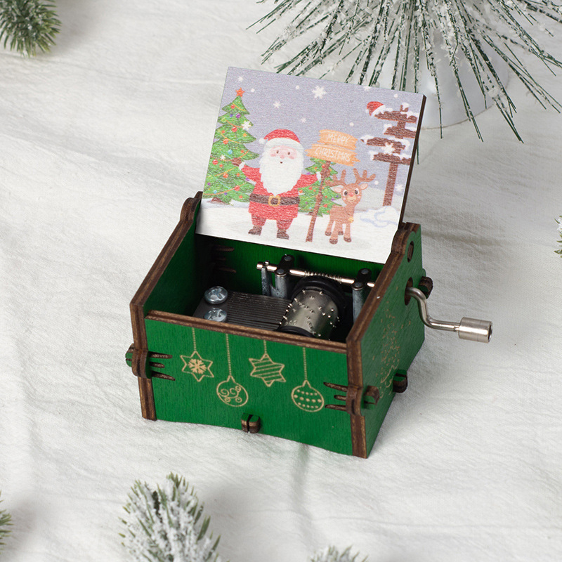 Decorative wooden music box with hand crank