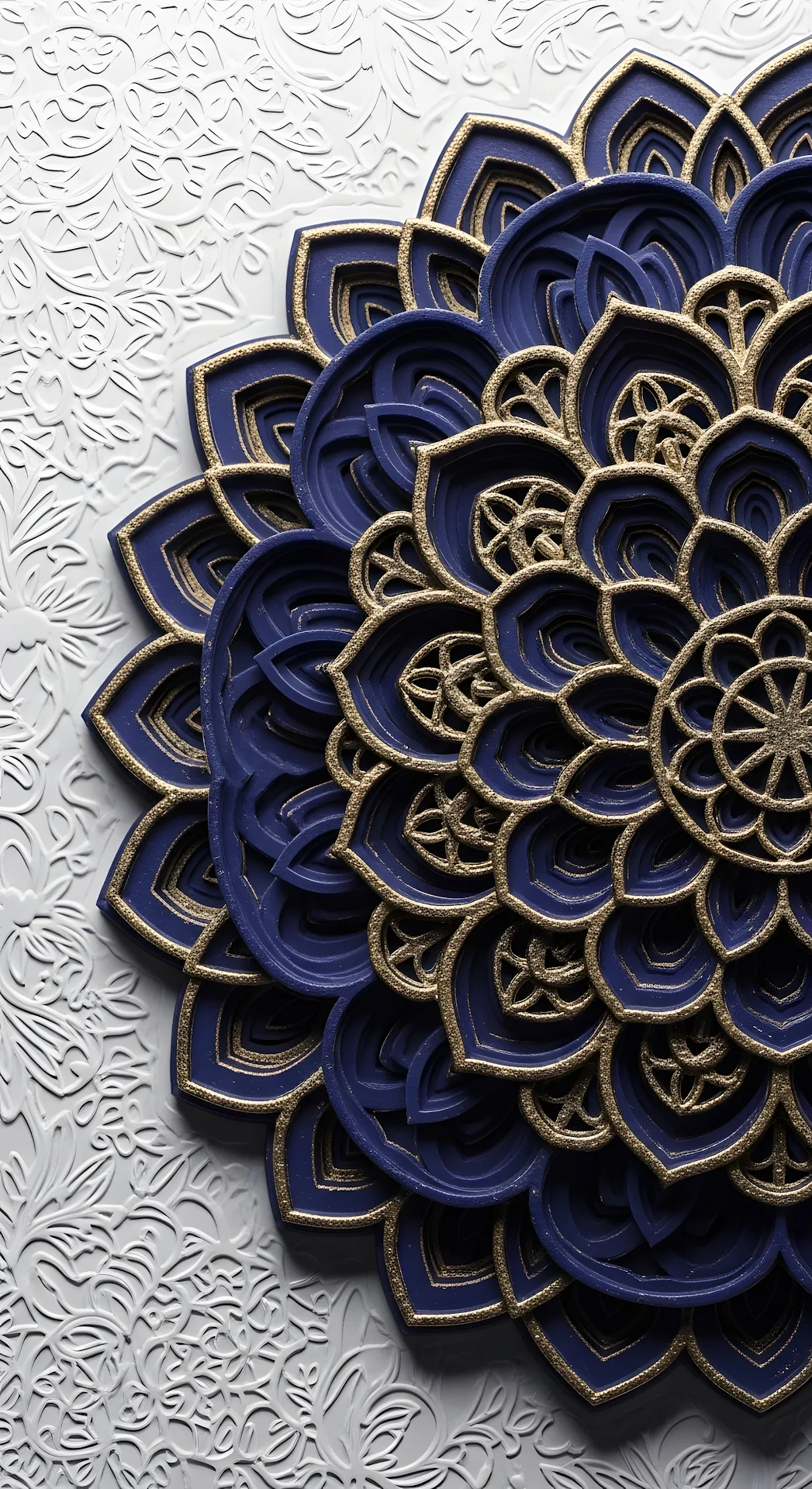 Intricate 3D Mandala Relief Pattern in Deep Blue and Gold Against a White Background - Free 4K mobile Wallpaper