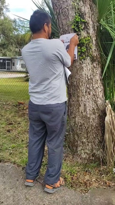 Photographie de l’album officiel « Distribution et affichage de tracts » — Florida , États-Unis (Travail missionnaire)