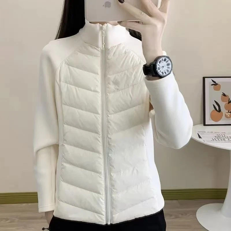 Light women's padded jacket, tailored, with stand-up collar
