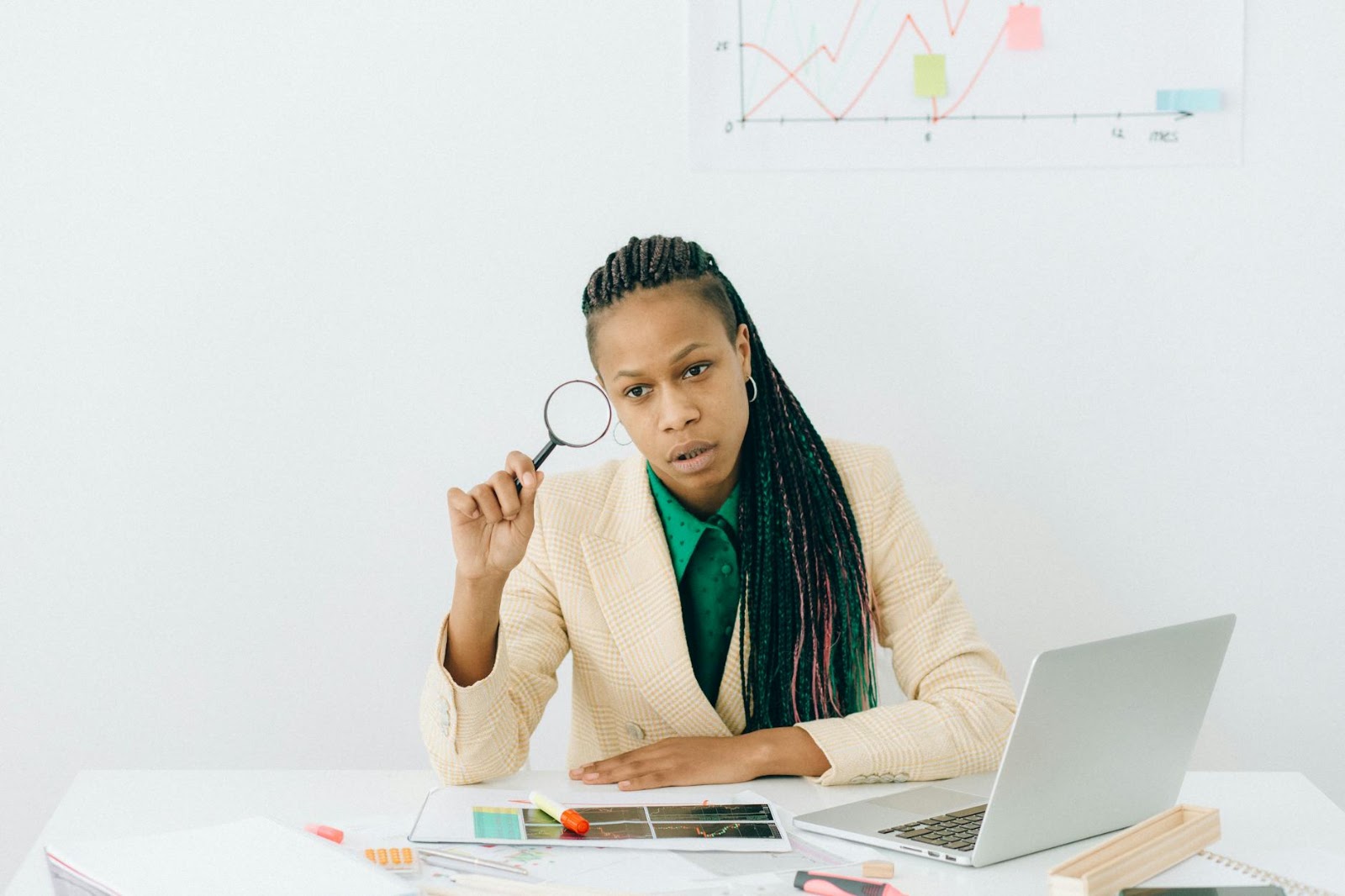 A person examining complex digital data with a magnifying glass, emphasizing critical analysis of AI hype vs. reality.