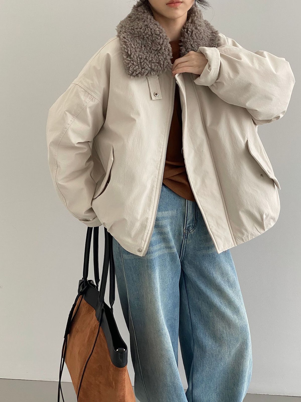 Gefütterte Damen-Daunenjacke mit Kunstfellkragen