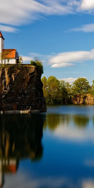 White Church On Rocky Cliff 4K Wallpaper Background