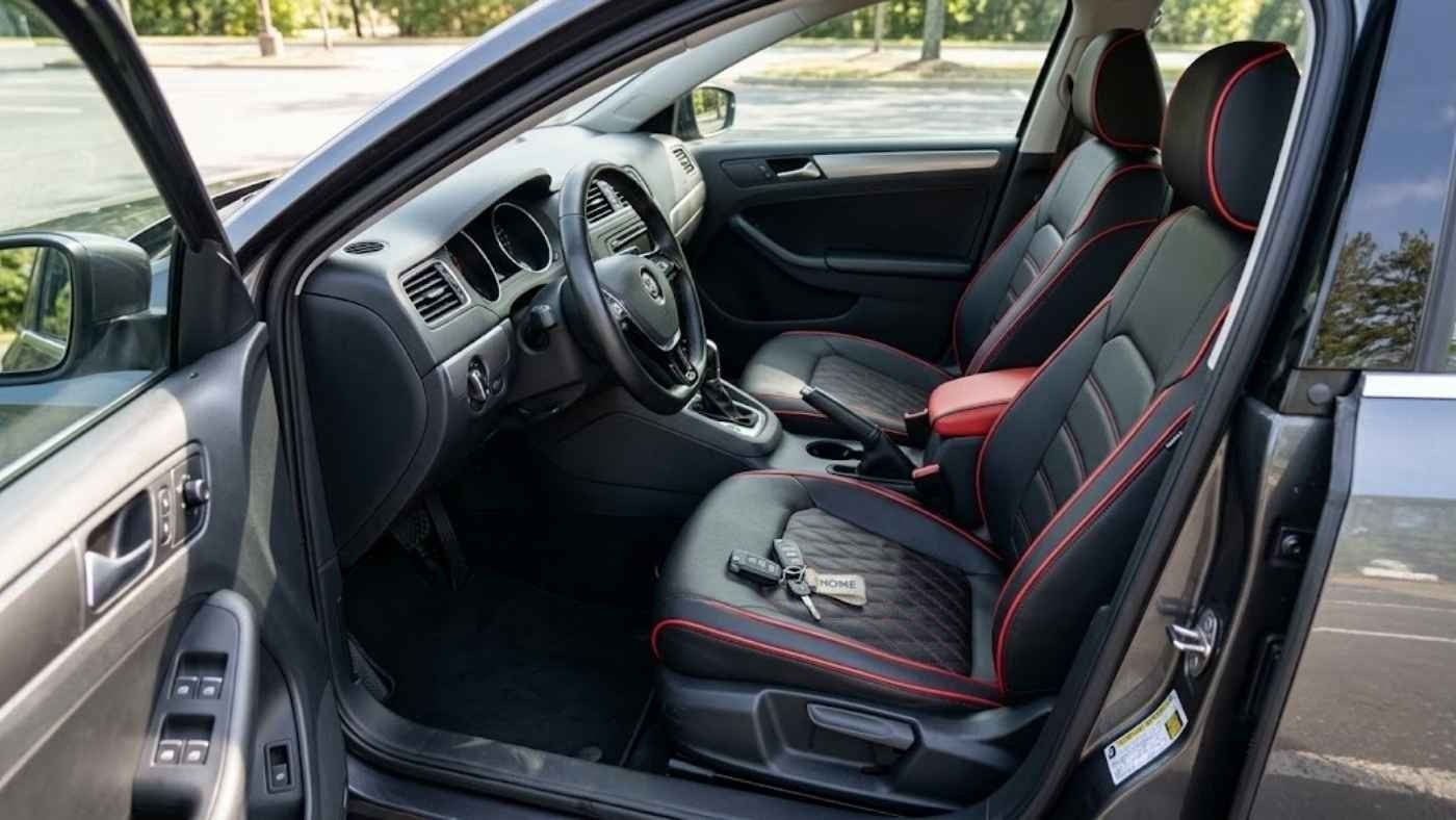 Perforated eco-leather cover fitted over the heated front seat of a 2027 GMC Sierra 1500 SLT