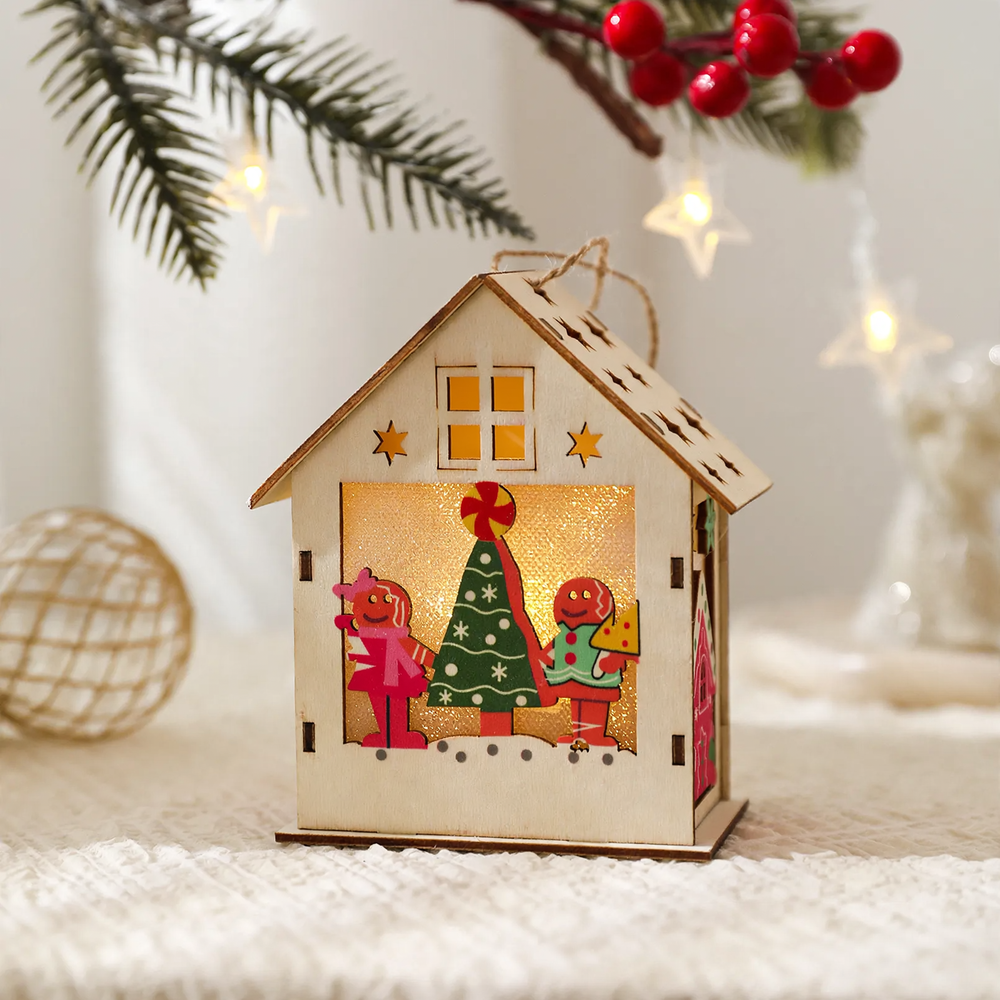 Illuminated wooden house as Christmas decoration