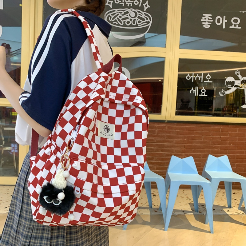 Backpack with letter pattern, 20–35 L