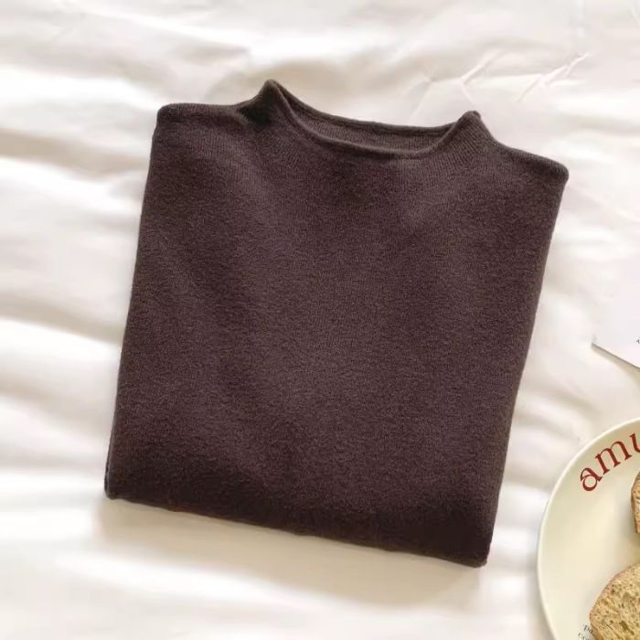 Women's knit pullover with stand-up collar, solid color