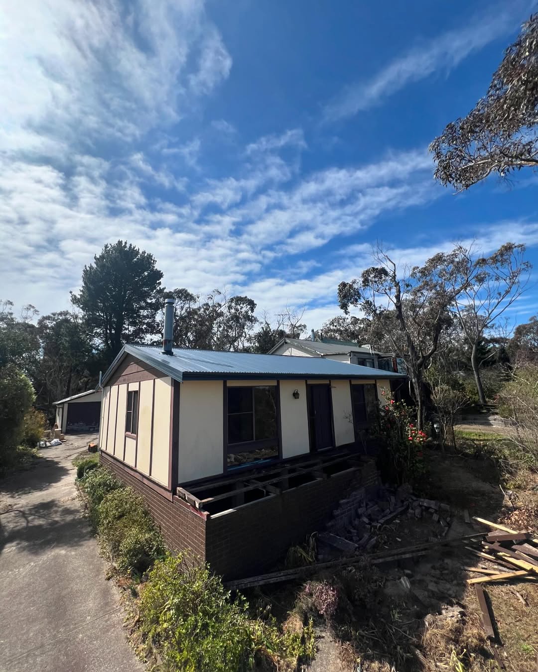 Dark metal roof completed job