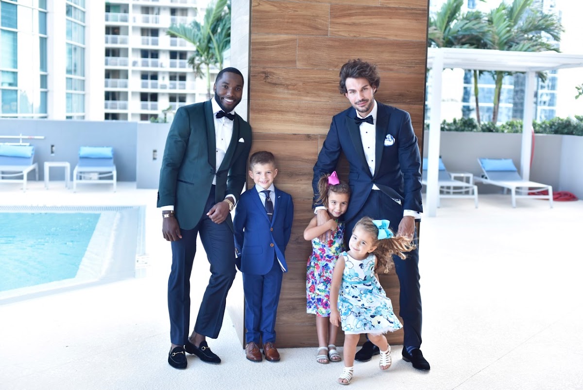 Two men in custom tuxedos at an upscale Miami wedding venue