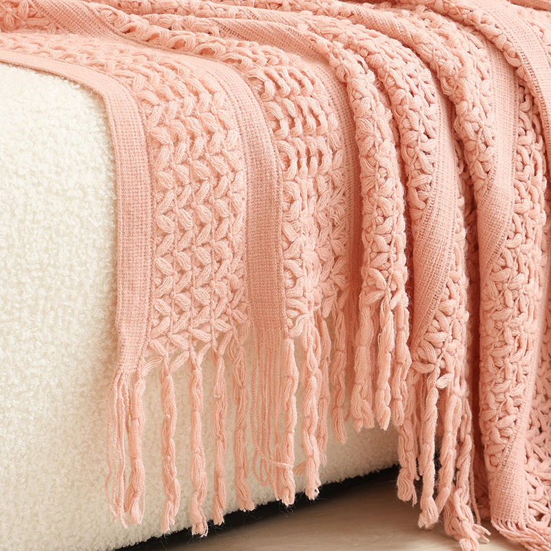 Decorative knitted blanket with fringes