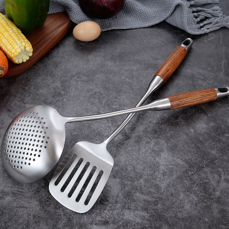 Stainless steel kitchen cutlery set with wooden handles
