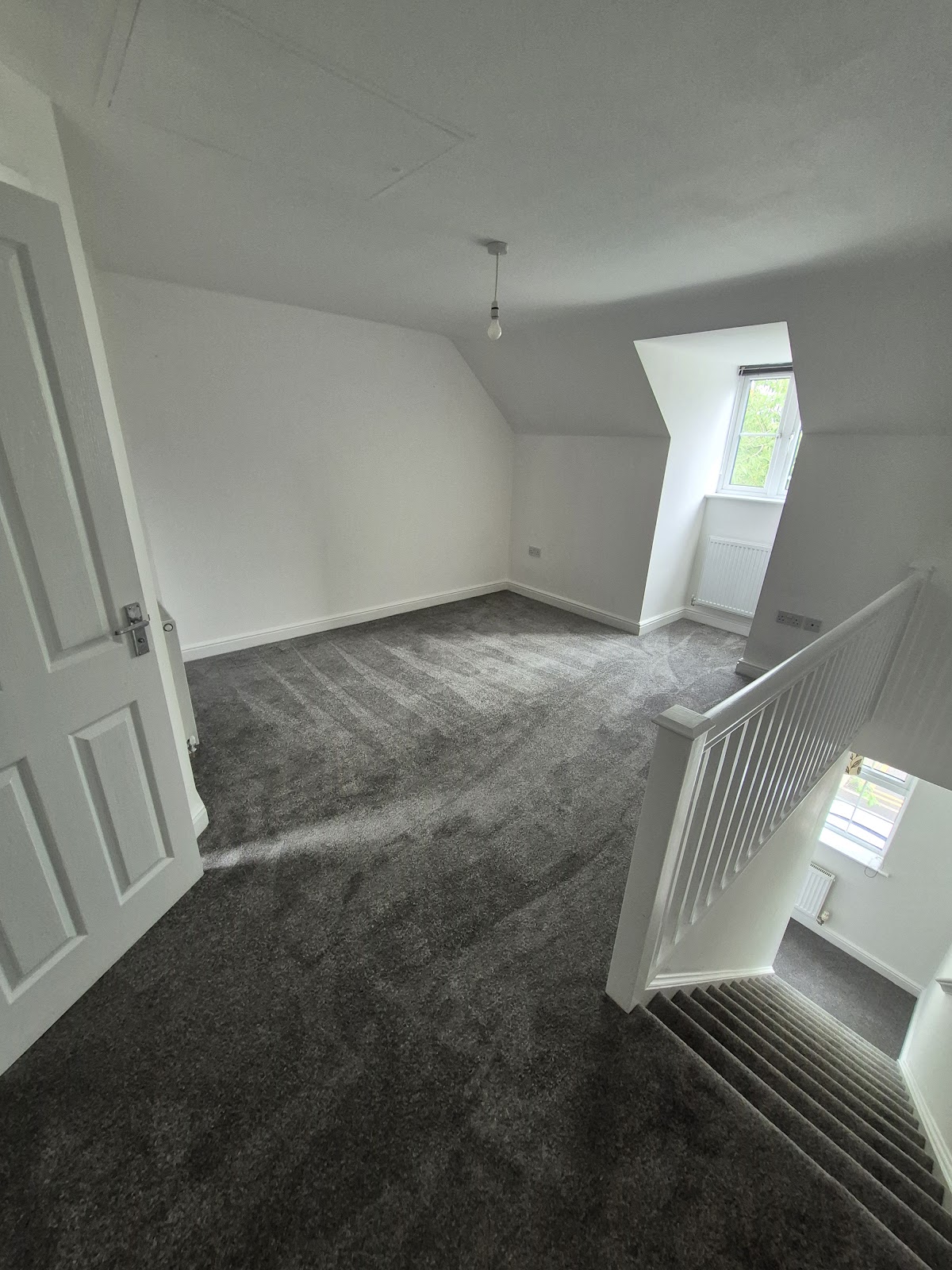 New carpet and vinyl flooring being fitted in a void property in Lincoln by LWR Group flooring subcontractor