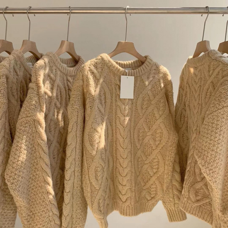Chunky knitted sweater with cable pattern