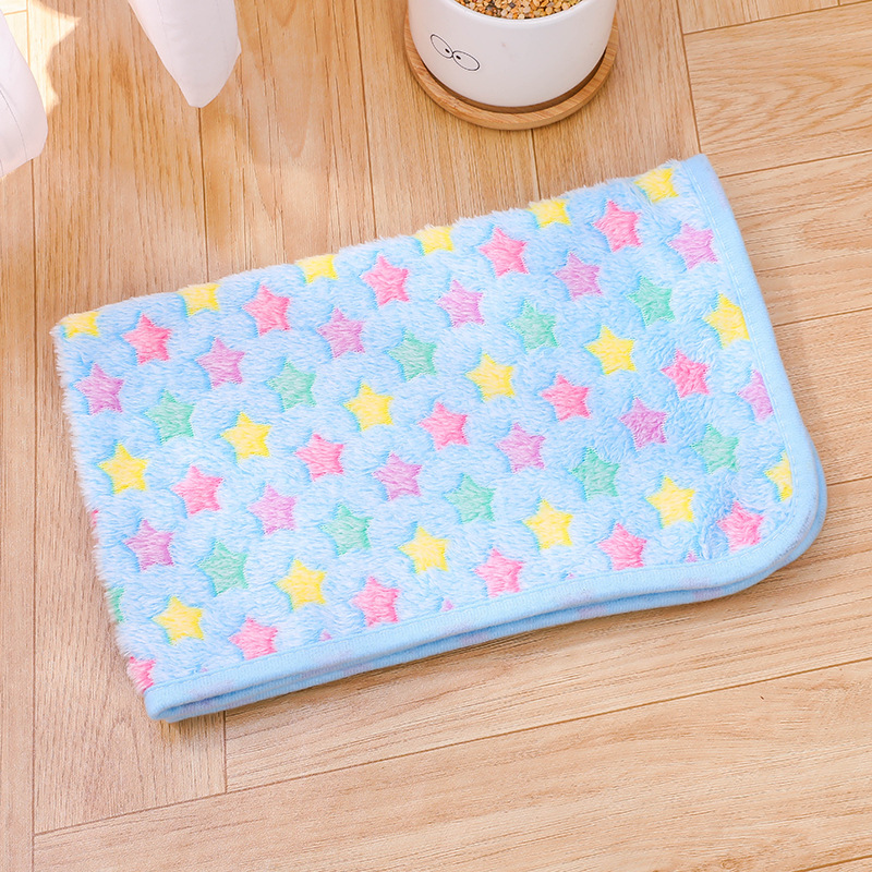 Fleece pet mat with paw and bone pattern