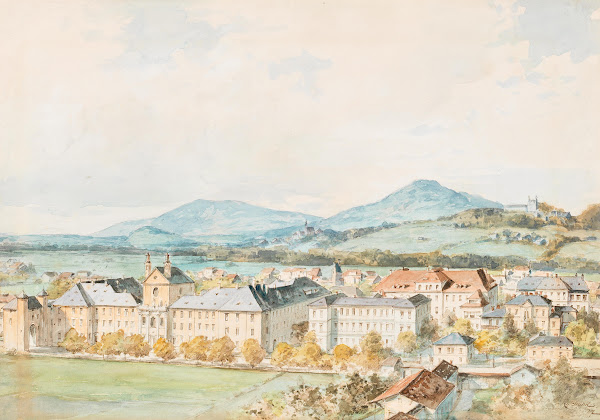 A view of Salzburg Salzach river in the foreground with the old St  Johns Hospit