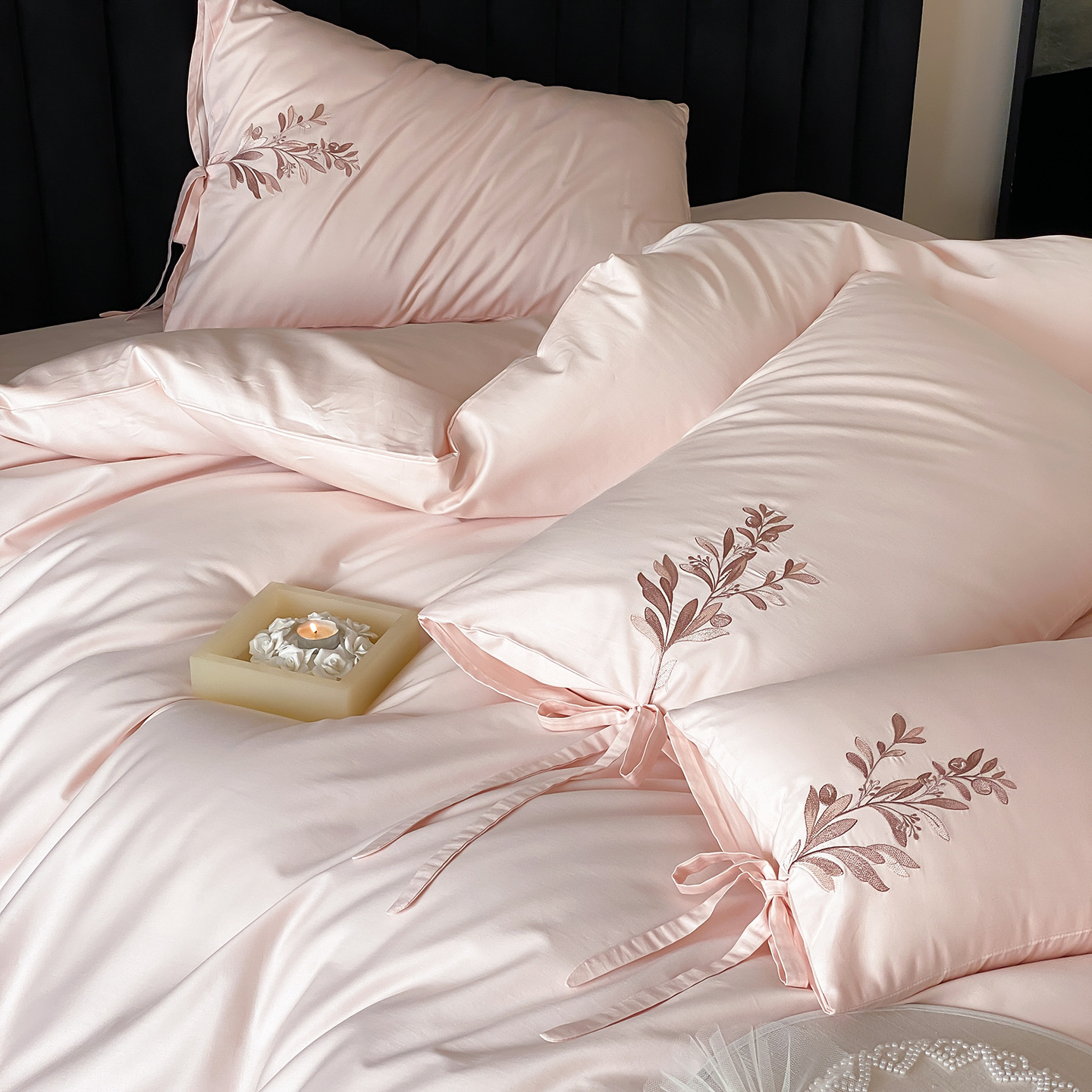 Embroidered cotton bedding with floral pattern