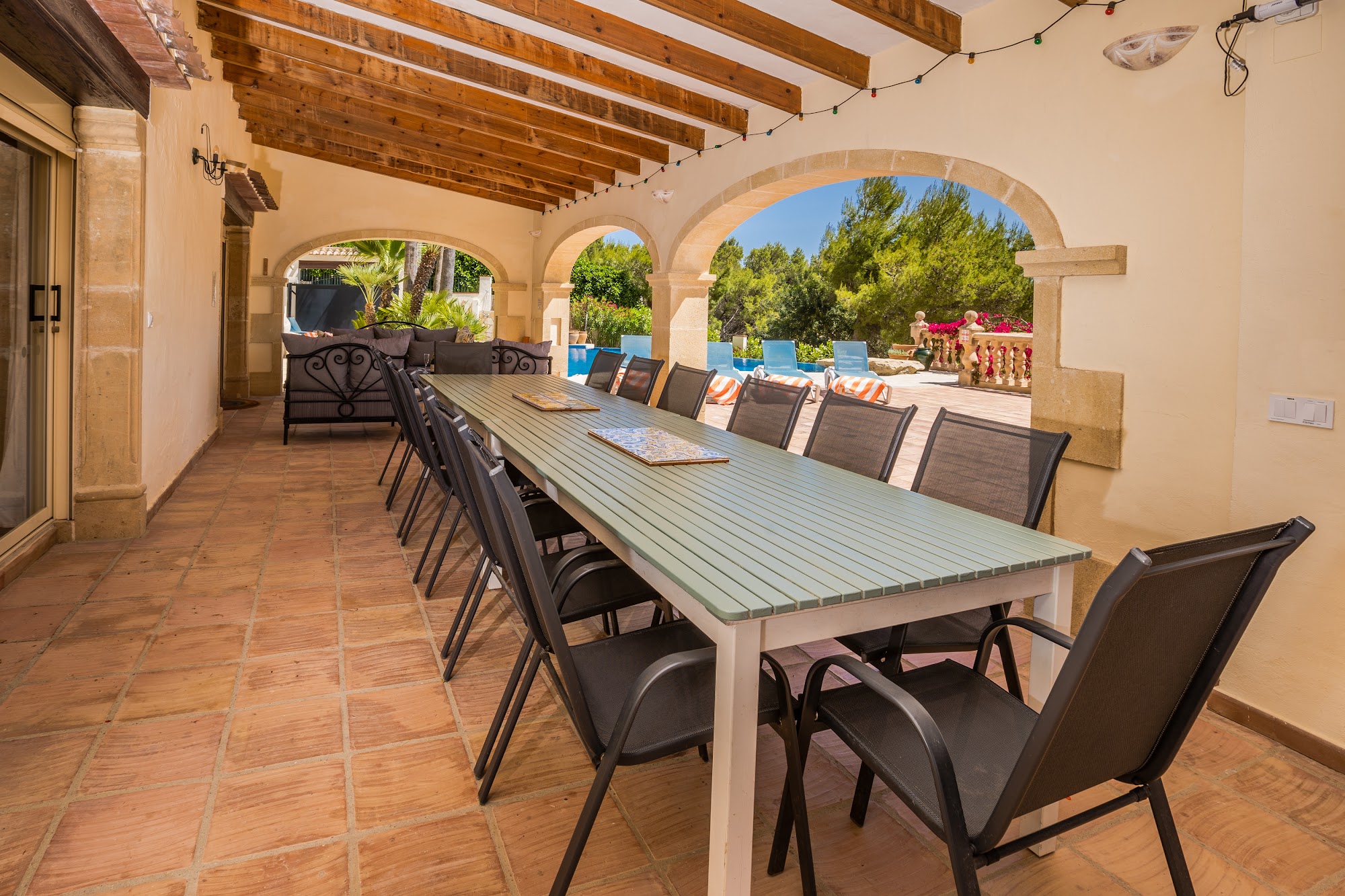 Outdoor dining terrace with garden views
