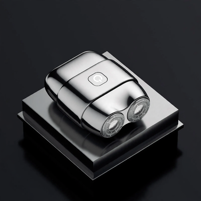 Portable electric razor with double blade ring