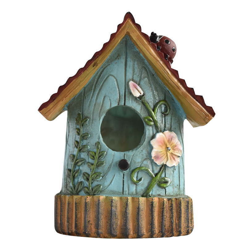 Decorative resin birdhouse for the wall