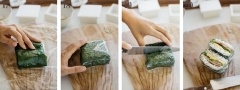 Cuối cùng gói màng bọc thực phẩm bao lá rong biển lại. Dùng dao nhúng chút nước rồi cắt đôi phần cơm nắm. Vậy là bạn có thể cho vào hộp được rồi. Bạn làm tương tự cho phần cơm, trứng, thịt nguội, rau xà lách còn lại nhé.