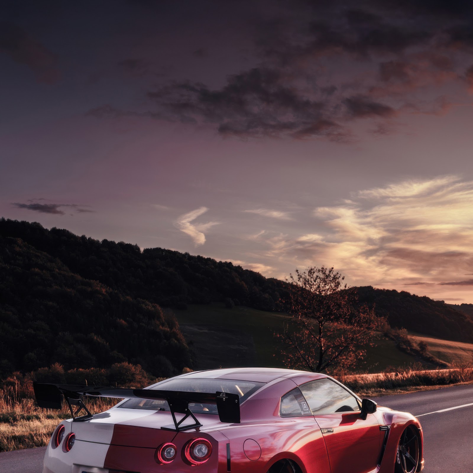 Download Nissan Gtr, Sports Car, Automotive, Sunset 2K iPhone
