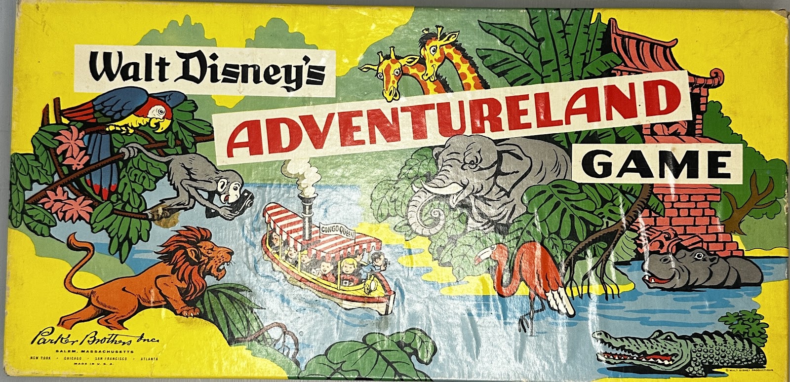 Parker Brothers 1960 Disneyland Monorail Game box, showing the red Mark I Monorail, the Matterhorn, Submarine Voyage, the TWA Rocket to the Moon, Sleeping Beauty Castle, and the Santa Fe & Disneyland Railroad