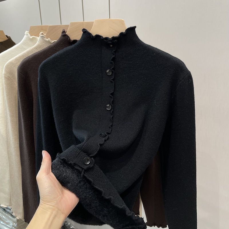 Women's sweater with stand-up collar and wave hem