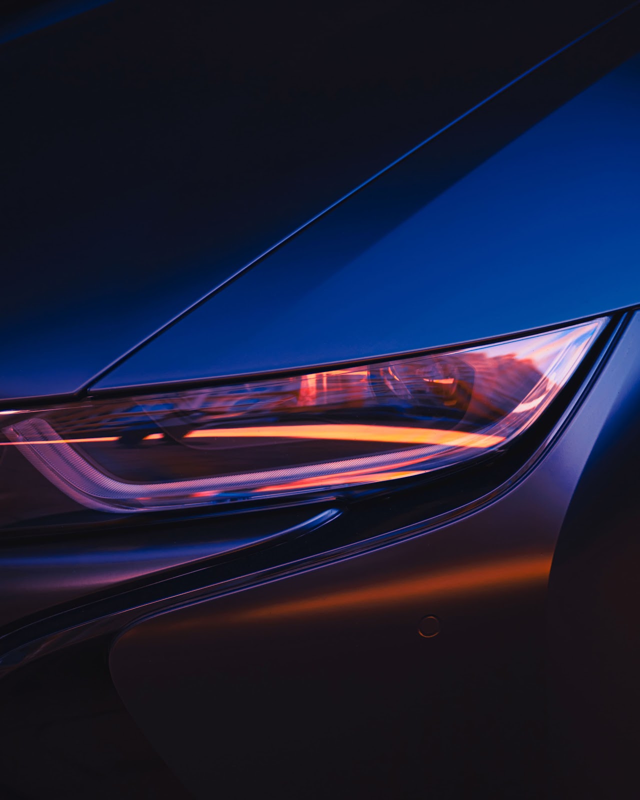 Modern Rentmotors premium car headlight close-up