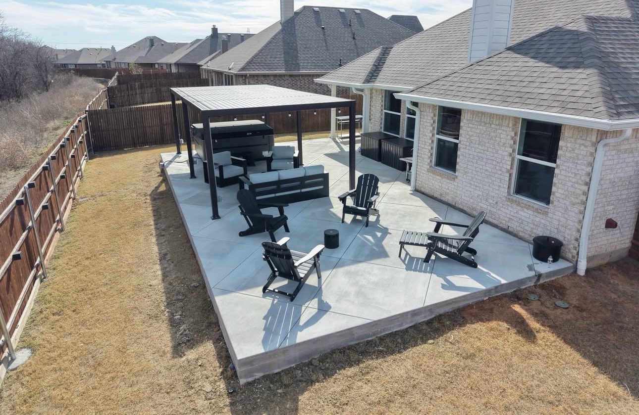 Beautiful concrete patio with gazebo by Abraham & Sons Masonry