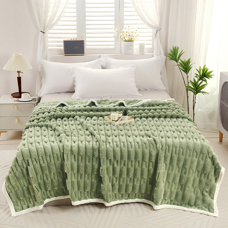 Warm plush blanket with faux fur appearance