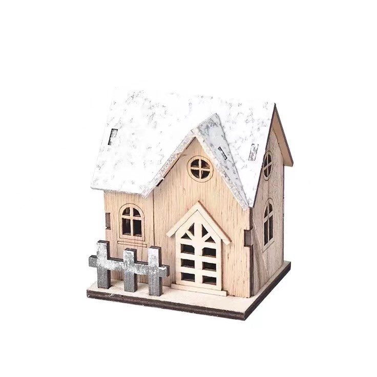Illuminated Christmas wooden house in Scandinavian style